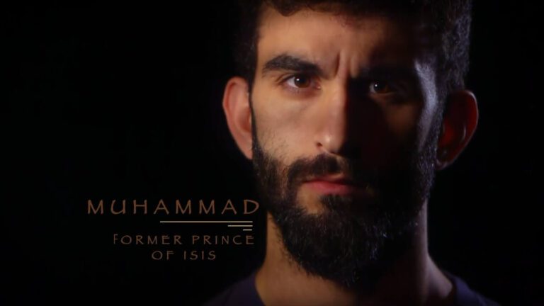 A man glares at the camera