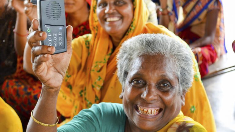 Indigenous people receiving solar powered pocket missionaries